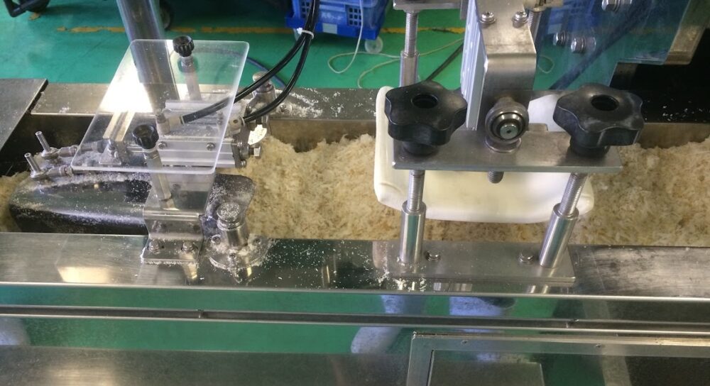 コロッケ・メンチカツ製造ライン パン粉付け機